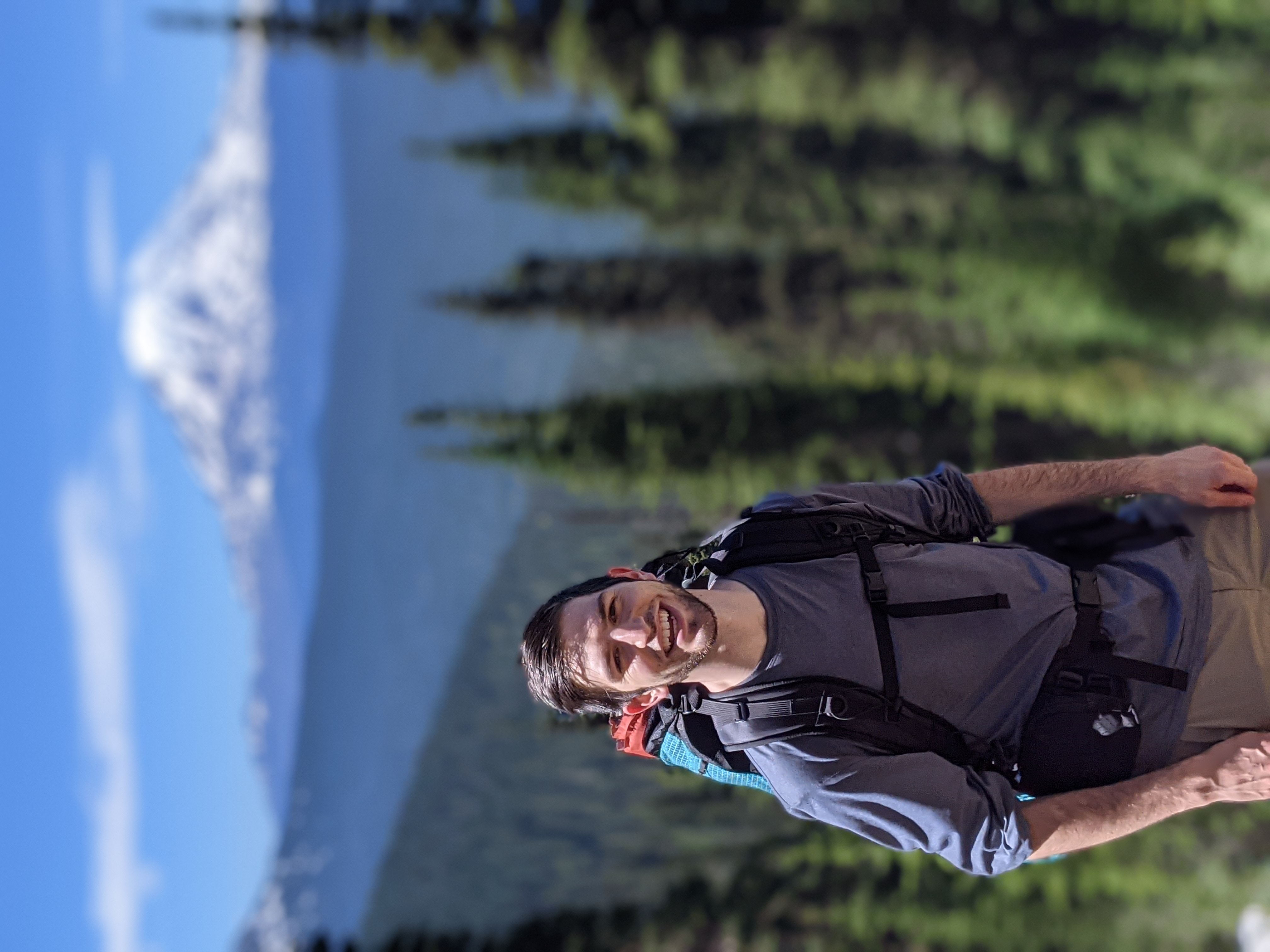 Man with mountain in background